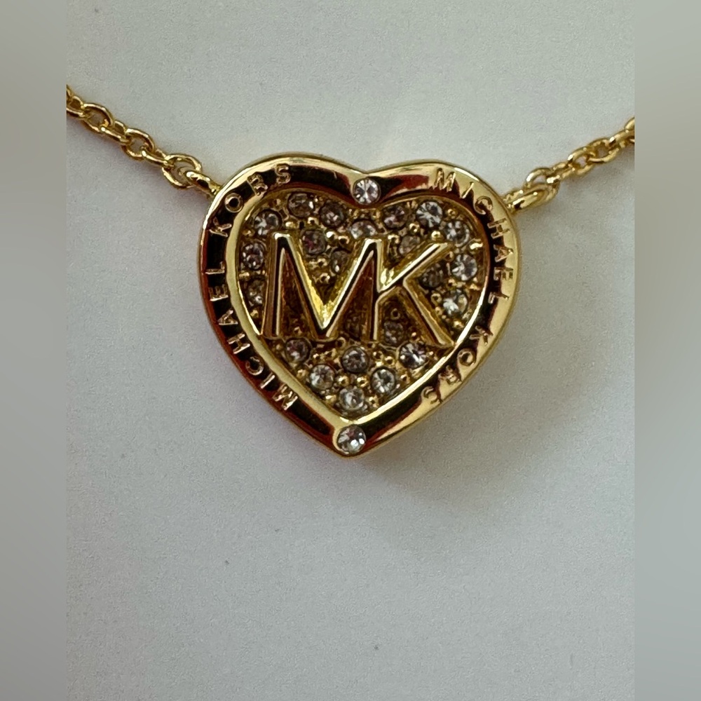Michael Kors Gold Heart Pendant Necklace with
MK Pavé new in box!